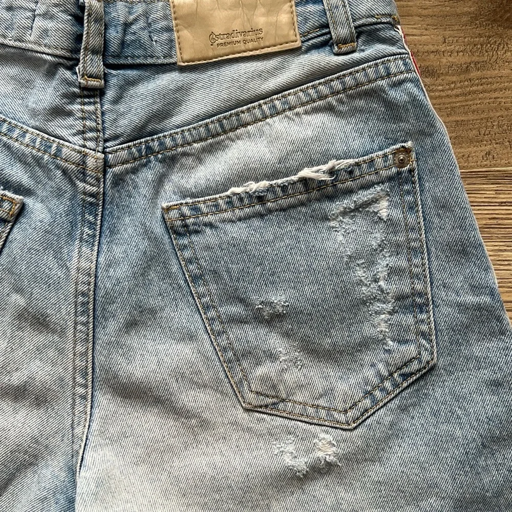 Stradivarius Light Blue‎ Distressed Jean Shorts with Red Accents